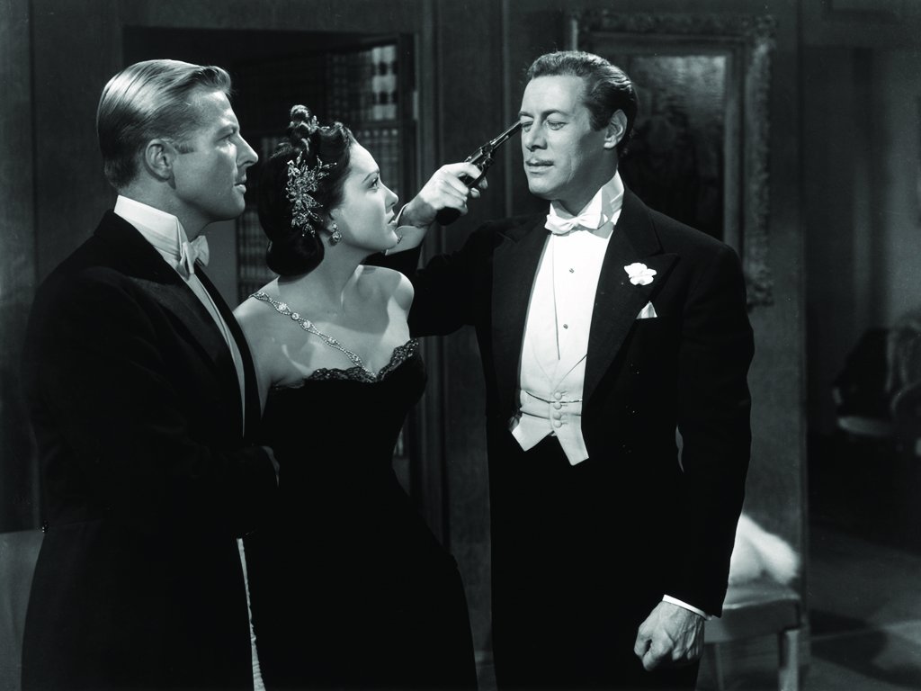 In one of his fantasies, Alfred challenges Tony to a game of Russian Roulette for the love of Daphne in Unfaithfully Yours