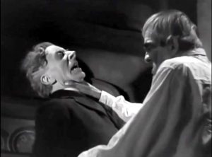 Butler Ernest Thesiger being chocked by his "dead" employer Professor Morland in "The Ghoul". You're fired!
